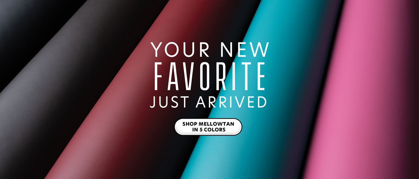 Five rolls of smooth Mellowtan leather in black, charcoal, burgundy, turquoise, and pink.