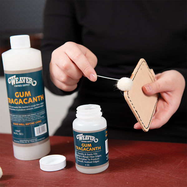 Applying Weaver Leather Supply Gum Tragacanth to smooth and burnish the edges of a hand-stitched leather piece.